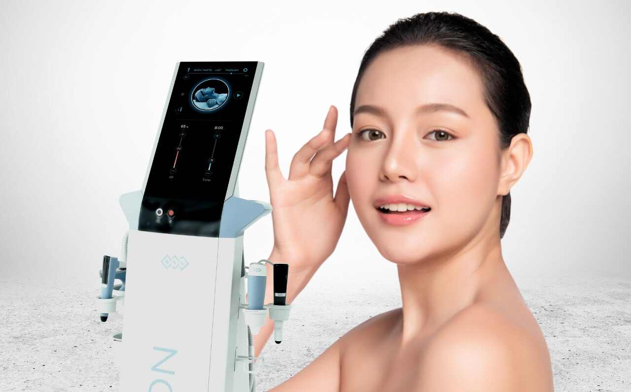 BTL Exion device with a youthful woman in the background, highlighting the advanced technology used in Exion Face treatments.