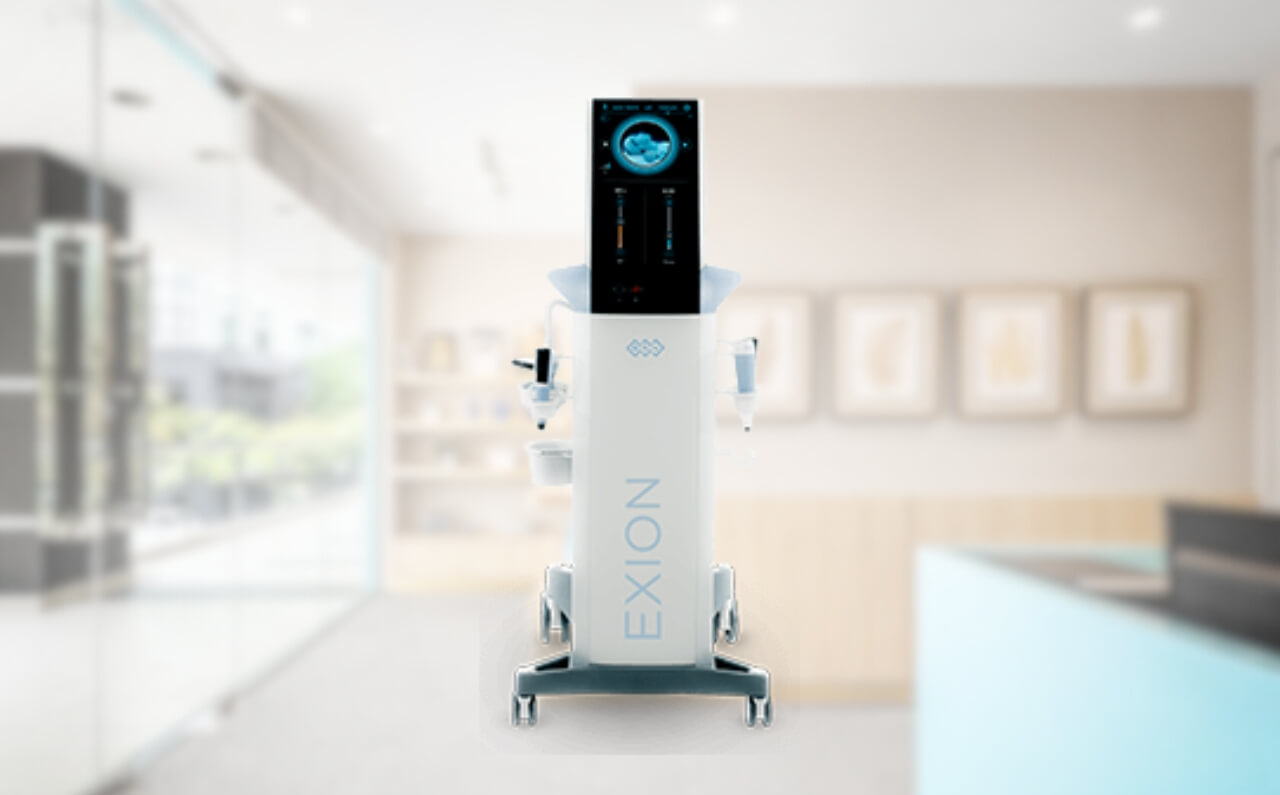 BTL Exion device with a subtle background of Dr Abby Clinic, highlighting advanced technology and a professional aesthetic clinic setting.